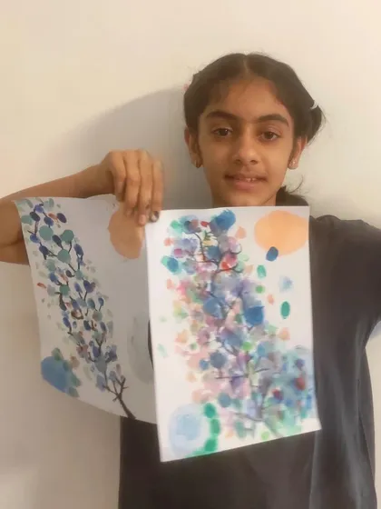 A closer look at two of the beautiful, abstract floral watercolors created by our student.