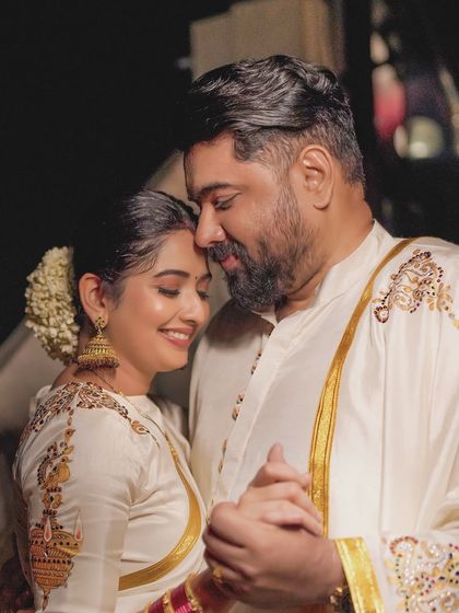 Arulaa by Rashmi Anoop Rao - Men's Custom Formal & Wedding Wear Coordinated Couple & Family Outfits photo 11