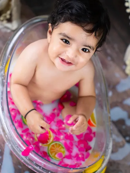Another beautiful milk bath, this time with pink petals and citrus slices for a pop of color. These sessions are fully customizable.