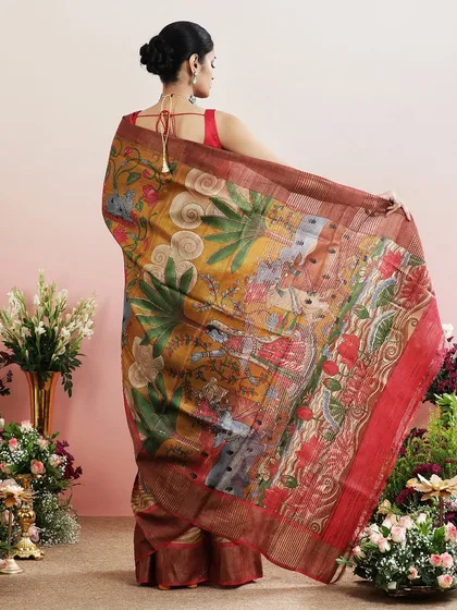 The back view of the saree, showing the full expanse of the beautifully printed pallu.