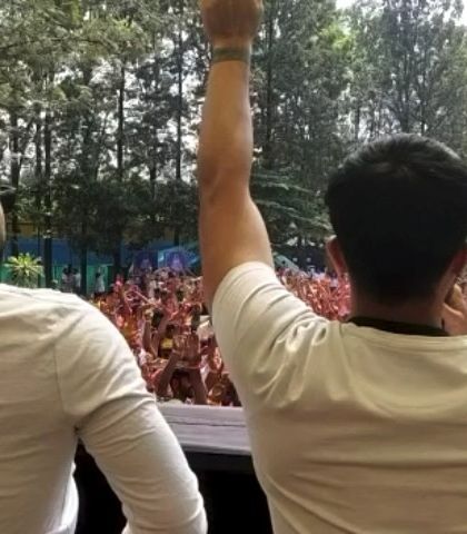 A view from the stage as I hype up the Holi festival crowd.
