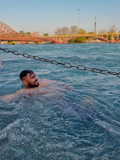Floating in the strong currents of the Ganga, a truly invigorating experience for body and spirit.
