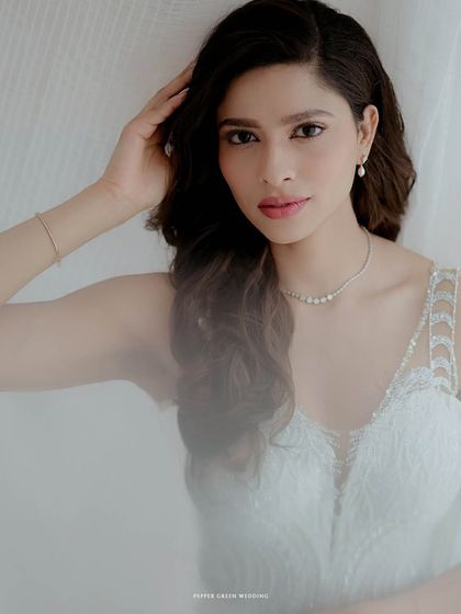 A soft and dreamy portrait of the Christian bride, the light creating a gentle, ethereal glow around her.