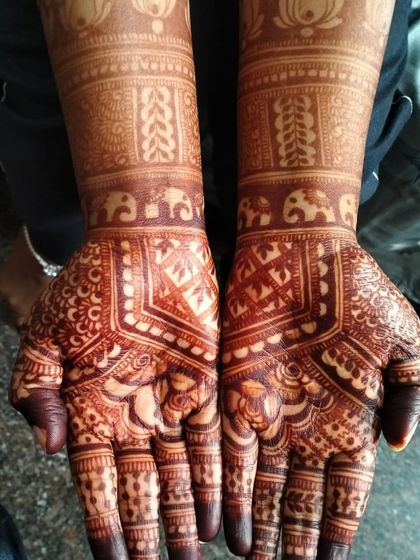 The rich, dark stain of Priyanka's engagement mehendi.