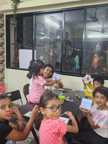 A candid shot from our Children's Day party. It's a joy to see the friendships that form in our creative and supportive environment.