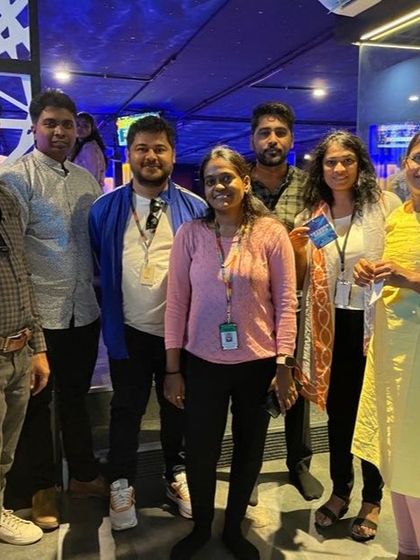 A team from a corporate event poses together, showing the fun and relaxed atmosphere we create for company gatherings.