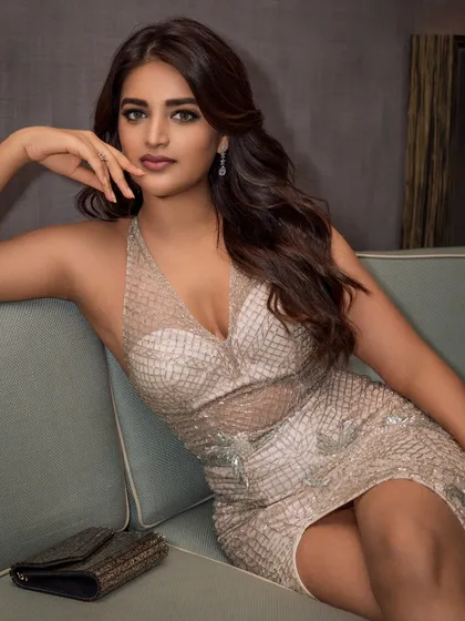 A glamour portrait of actress Nidhhi Agerwal, showcasing a sophisticated and polished look for an event. My process involves careful lighting and retouching to create magazine-quality images that highlight the subject's personality.