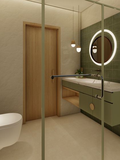 A view through the glass shower door, showing the cohesive design of the bathroom. The wall-mounted toilet and floating vanity make the space feel larger and easier to clean.