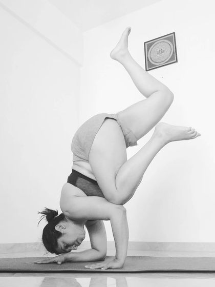 Another moment from the same Pincha sequence, capturing the concentration and physical effort required.