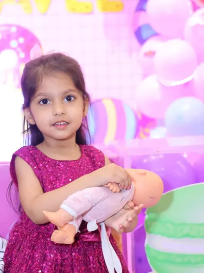An adorable party guest at our Candyland celebration. Every party is filled with sweet moments like this.
