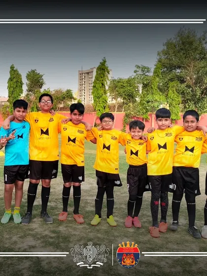 The NIFC Academy team, one of the many talented groups we work with, showing the smiles and teamwork that football fosters.