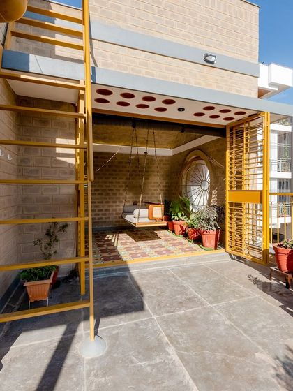 A view from the terrace into the semi-open lounge.