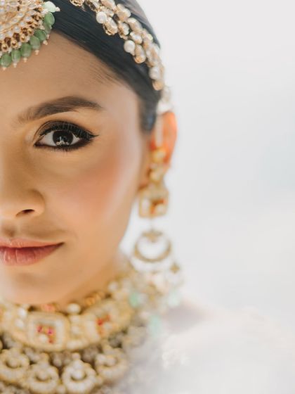 The perfect bridal makeup looks beautiful from every angle. Here, you can see the clean lines and soft blending that create a polished, high-definition finish perfect for wedding photography.
