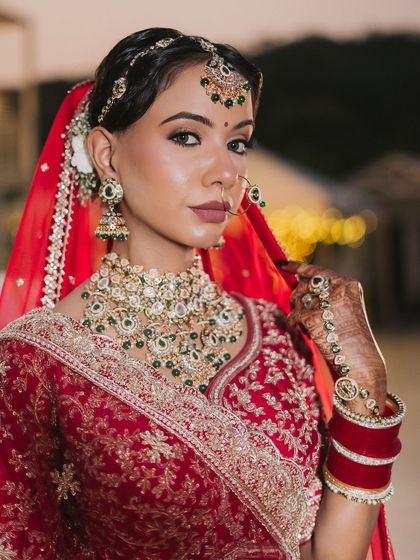 A close-up showcasing the detailed eye makeup and flawless base. This look is perfect for the bride who wants to make a statement.