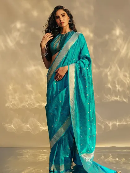 A beautiful turquoise Benarasi saree. This shows how versatile these weaves are, perfect for a wedding guest or for a pre-wedding function.
