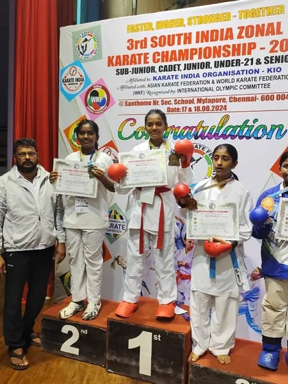 A different angle of the victory ceremony. Shikha's achievement is a testament to her relentless training and the competitive spirit of our team.
