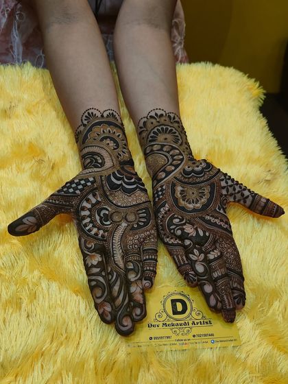 Another angle of the bold Arabic fusion design, showing the intricate details on the palm and fingers.