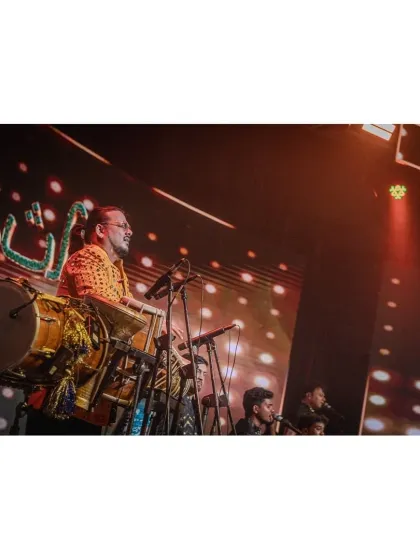 The dhol brings an unmatched energy, even to a formal corporate setting.