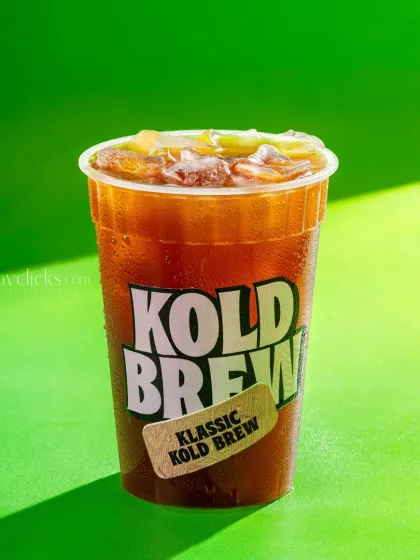 A classic cold brew coffee, simple and strong, in a branded cup.