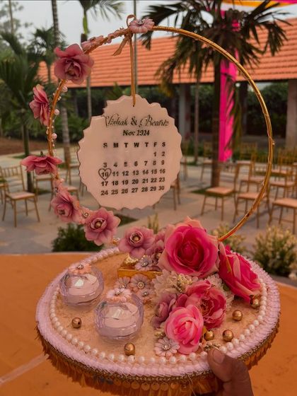 A beautiful and modern engagement ring platter with a custom calendar marking the special date.