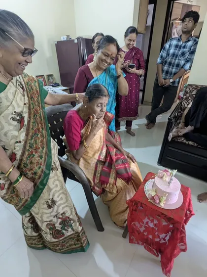 The moment of celebration with the "Super Perimaa" cake. It's always wonderful to see the joy my cakes bring to families.