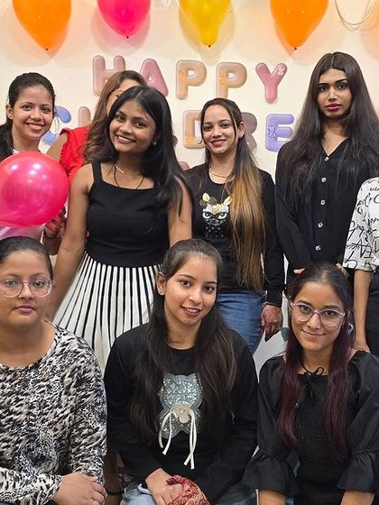 Our students enjoying a moment of fun and friendship during an academy celebration.