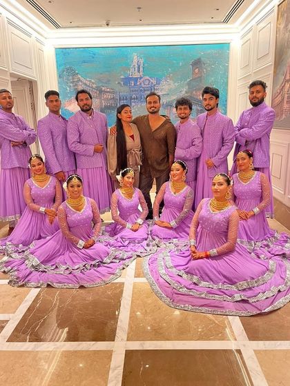What a show we had. A proud moment with our incredible team of performers, all in costume, after pulling off another spectacular Sangeet event.