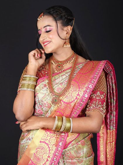 A happy and confident bride-to-be. This close-up shows the detailed eye makeup and how it brightens her entire face.