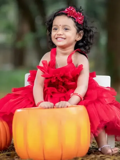 A little princess enjoying the sunshine. Our outdoor sessions use beautiful natural light to capture the bright energy and sweet smiles of your growing child.