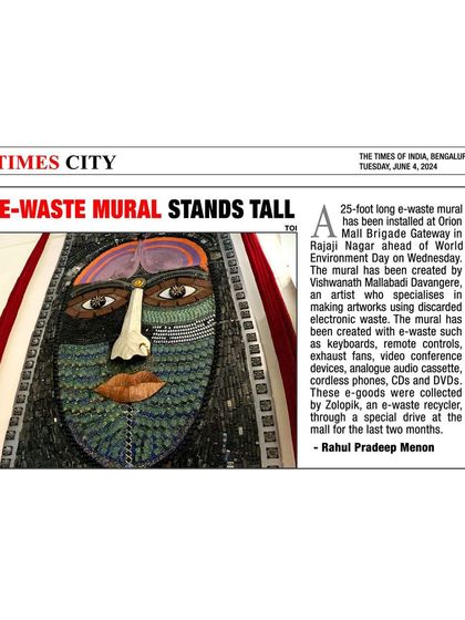The Times of India covered my 25-foot e-waste mural in their Times City section. The article, "E-WASTE MURAL STANDS TALL," details the materials used and the message behind the installation.