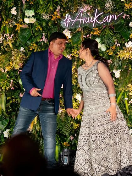 Even family members can have their own romantic duet. Here, a couple enjoys their moment on the dance floor.