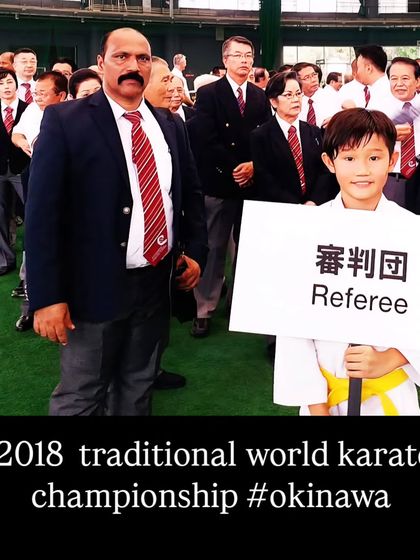 Serving as a referee at the 2018 Traditional World Karate Championship in Okinawa. Participating in global events ensures our standards remain at the highest level.