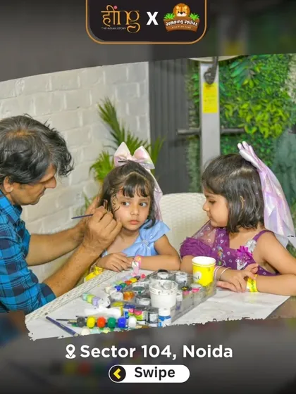 A young guest gets her face painted during a Barbie-themed party. Face painting is a creative and fun activity that lets kids transform into their favorite characters.