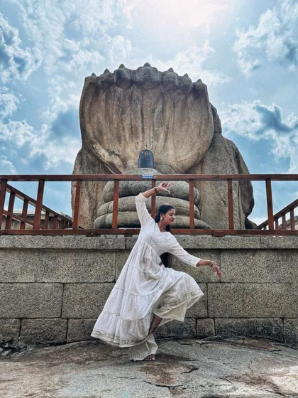 My dance amidst the stone structures and open sky at Lepakshi creates a unique blend of art and culture that fills me with joy.