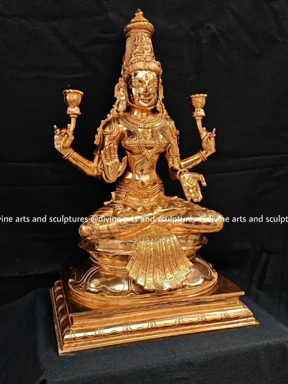 The full view of the polished Lakshmi idol, seated on a lotus pedestal, embodying grace and abundance.