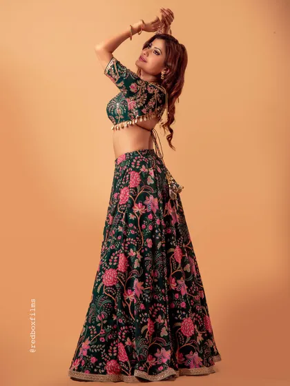 I designed this floral lehenga set for a catalogue shoot. The outfit features a custom print on a flowing skirt paired with a hand-embroidered blouse, creating a modern yet traditional look perfect for festive occasions.