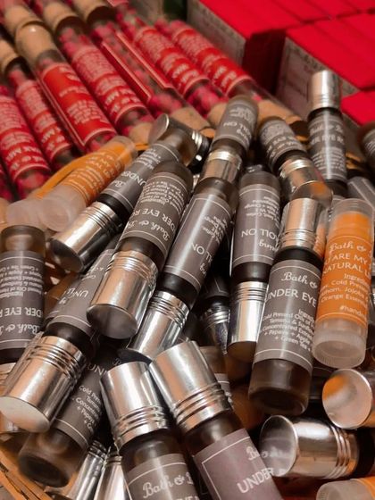 I truly love bulk orders. This is a glimpse of a large project that included under-eye roll-ons, wax melts, lip balms, and soaps, all handmade and ready to be packed.