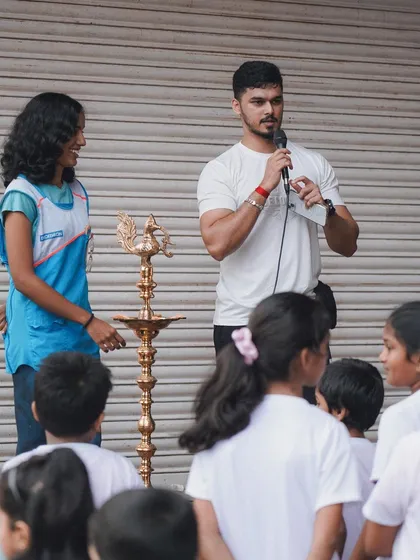 Speaking to the children at the event, joined by a representative from our partner, Decathlon.