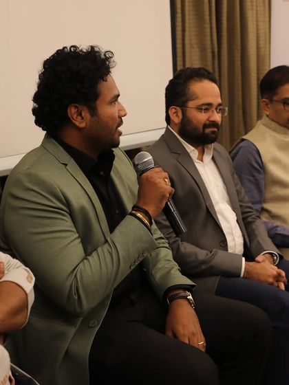 Our Principal Architect, Rohith Krishna, speaking as a panel member at a GIBCO community event. We believe in sharing knowledge and contributing to the growth of our professional community.