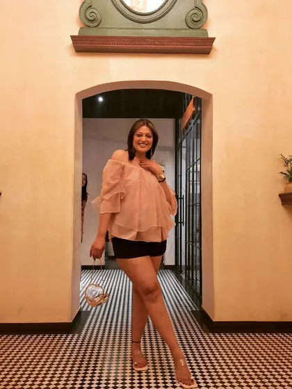 The perfect outfit for exploring the charming corridors of a Goan hotel.
