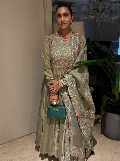 A throwback to one of my favorite festive looks. This sage green Anarkali with delicate embroidery is timeless, elegant, and perfect for any celebration.