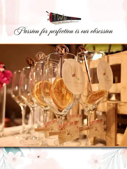 Custom initialed glass markers and flamingo-themed straws for a fun and personalized Sangeet night at Taj Lands Mumbai.