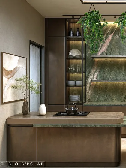 The kitchen island features an integrated cooktop and a breakfast counter, making it a multi-functional hub for cooking and socializing. The design is both practical and elegant.