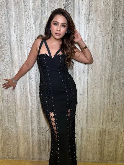 A full length view of this incredible party outfit. The makeup and hair I designed were the perfect complement to her daring and sexy lace up dress, creating a cohesive and head turning look.