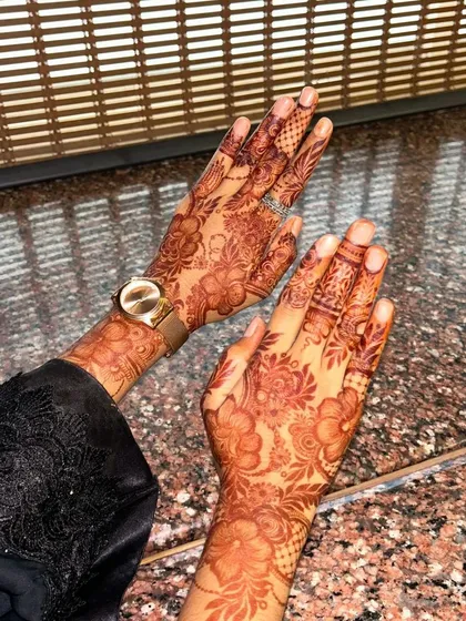 This photo captures the consistency of the stain across both hands. Using fresh, handmade cones ensures an even and reliable color every time.