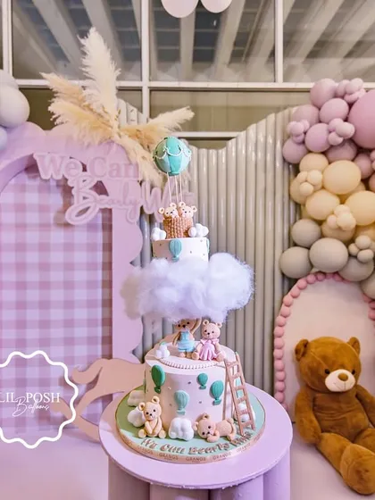 The centerpiece of the "We Can Bearly Wait" baby shower was this incredible cake, perfectly matching the theme with teddy bears, clouds, and hot air balloons.