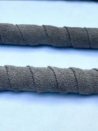 A close-up of the leather grip handle on my heeling stick. I chose this material because it provides a firm, comfortable grip for the handler in any weather condition.