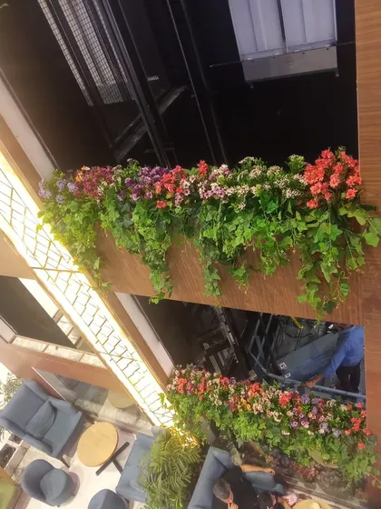 Another angle of the beautiful floral and ivy arrangements on the mall's internal balconies.