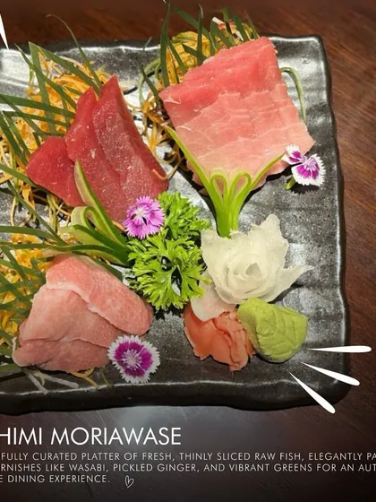 Our Sashimi Moriawase is a beautifully curated platter of fresh, thinly sliced raw fish. Elegantly paired with garnishes like wasabi and pickled ginger, it offers an authentic and refined Japanese dining experience.