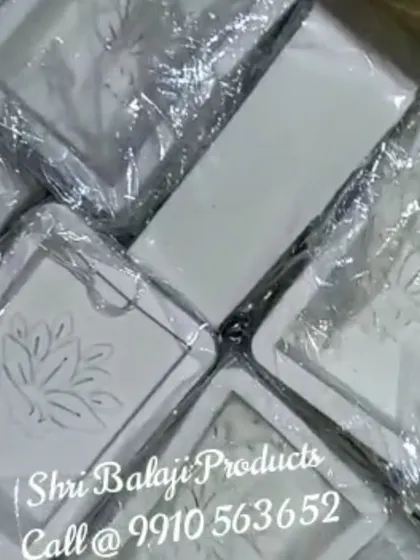 Your order, ready to go! This shows a batch of custom-made silicone molds with a lotus design, all packaged and ready to be shipped to another creator starting their brand journey.